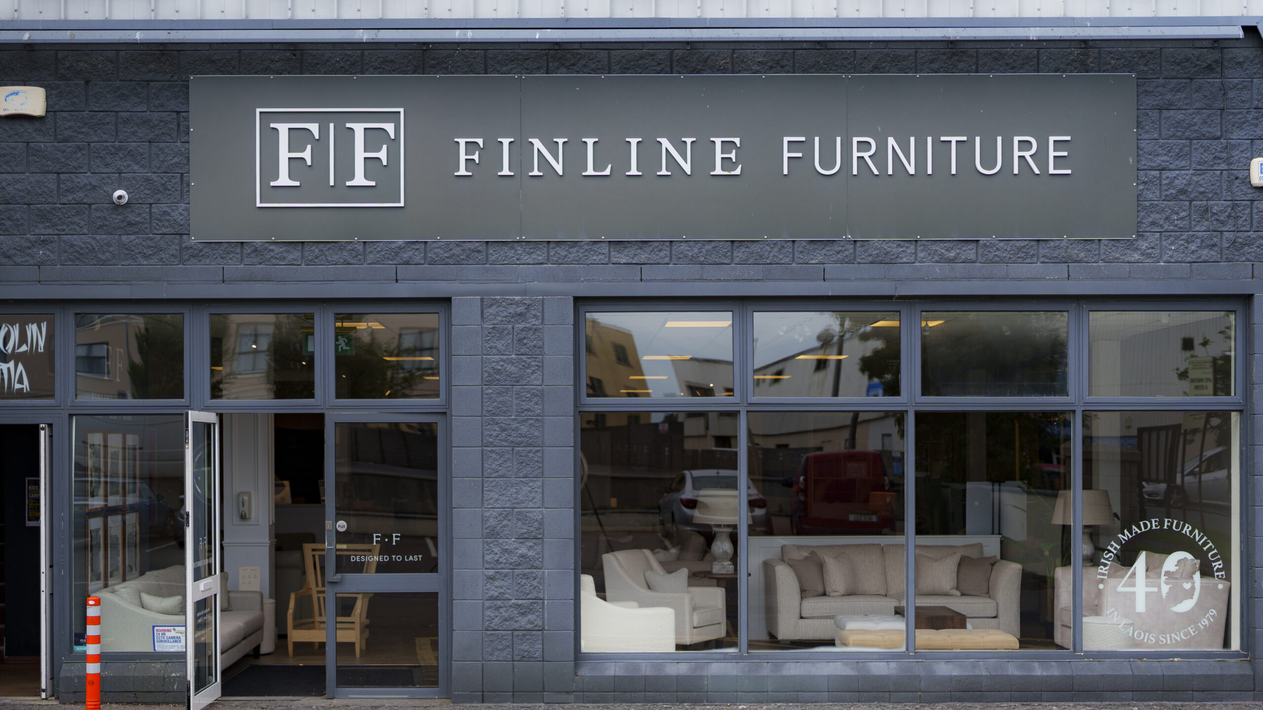 A Finline sofa and armchair in a styled room