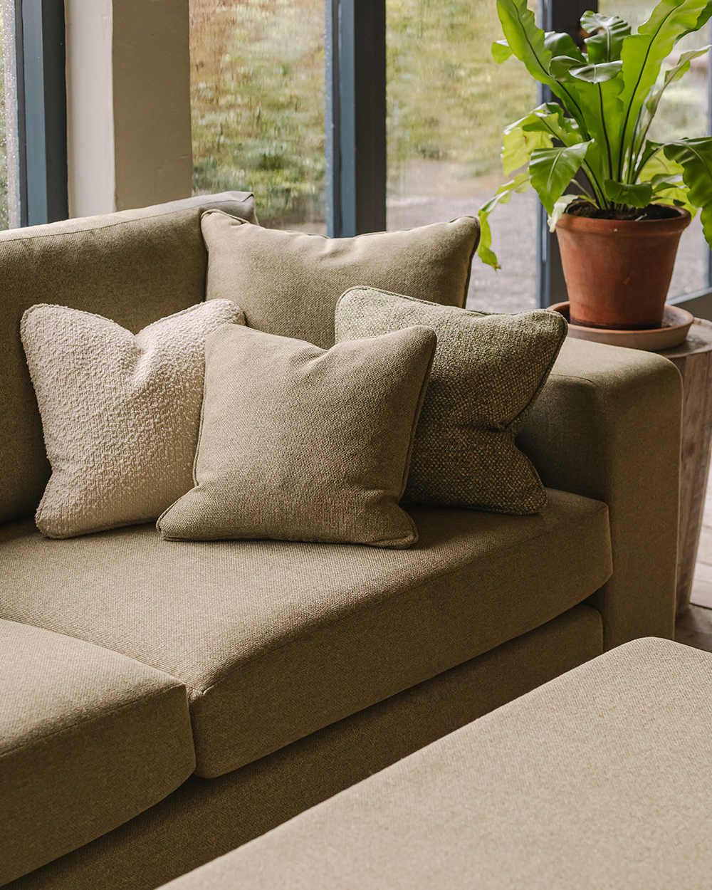 Finline scatter cushions on a sofa
